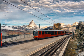 The electric train with Matterhorn mountain on summit at Gornergrat station