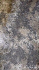 Grungy concrete wall texture with scratched paint.