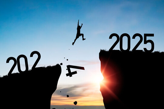 Welcome merry Christmas and happy new year in 2025,Silhouette Man jumping from 2024 cliff to 2025 cliff with cloud blue sky and sunlight. - Powered by Adobe