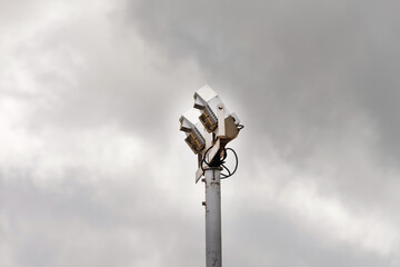 Large spotlight against a cloudy sky