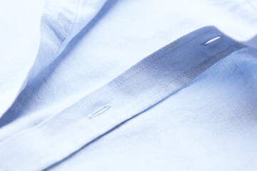 Close up of men's linen shirt. Soft focus.	