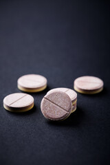 Vitamin effervescent Tablets on paper background. Close up. Copy space.	