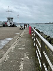 Mountbatten pier in Plymouth Sound on a grey cold winters day. 
