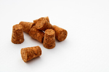 Various messy corks on white background