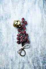 Christmas branch on rustic wooden background. Copy space.