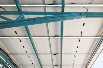 Solar car parking or parking lot at outdoor. Roof canopy covered or construction from solar panel. Innovation system technology to generate electricity from light. Concept of green clean power energy.