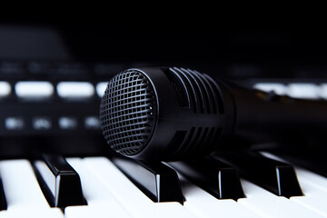 Microphone on keyboard . Close up.	