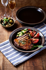 Grilled Turkey Breast with fresh salad. Close up.	