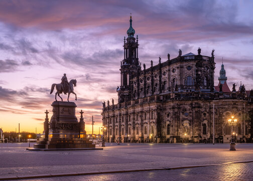 Dresdner Hofkirche (Dresden Cathedral) and K&ouml;nig-Johann-Denkmal (King Johann monument) at sunrise, Theatre square (Theatherplatz) Dresden, Saxony, Germany