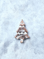 Christmas ornament on a rustic stone background. Soft focus. Top view. Copy space.