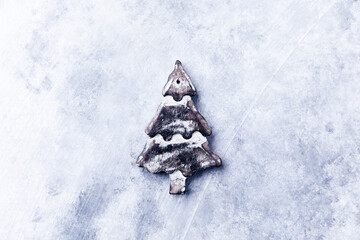 Christmas ornament on a rustic stone background. Soft focus. Top view. Copy space.