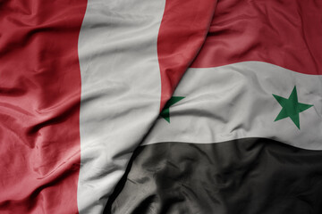 big waving national colorful flag of syria and national flag of peru .