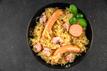 cabbage sauerkraut garnish meat, sausage tasty fresh eating cooking appetizer meal food snack on the table copy space food background rustic top view
