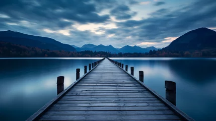 Foto auf Acrylglas  Empty wooden bridge or jetty with mountain on lake © Marukhsoomro
