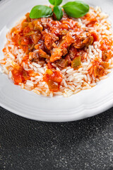 meat with rice chicken Basque tomato sauce tasty fresh eating cooking appetizer meal food snack on the table copy space food background rustic top view