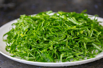 Kale leaves chopped and sliced into thin strips