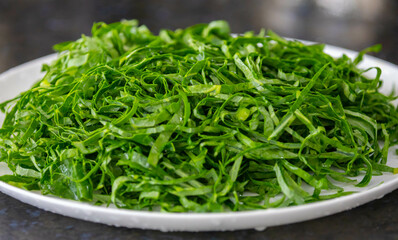 Kale leaves chopped and sliced into thin strips
