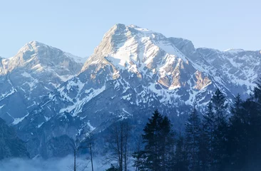 Fotobehang Lake Almsee and Mist with Snowy Sunny Mountains Panorama © EvaH