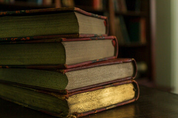 stack of old books on the table