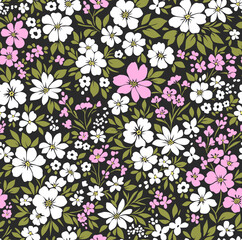 Beautiful floral pattern in small abstract flowers. Small pink and white flowers. Black background. Ditsy print. Floral seamless background. Liberty template for fashion prints. Stock pattern.