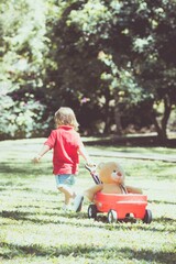 parent and child playing in the park