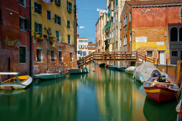 Colorful houses, canals and bridges in Venice, Italy