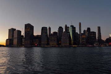 Obraz premium The New York skyline was taken from Brooklyn Bridge Park before sunset on February 3rd, 2024. 