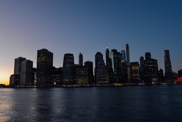 Fototapeta na wymiar The New York skyline was taken from Brooklyn Bridge Park before sunset on February 3rd, 2024. 