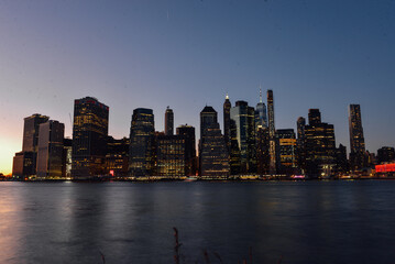 Fototapeta premium The New York skyline was taken from Brooklyn Bridge Park before sunset on February 3rd, 2024. 