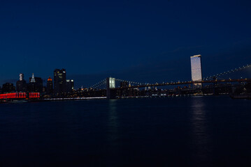 Naklejka premium The New York skyline was taken from Brooklyn Bridge Park before sunset on February 3rd, 2024. 