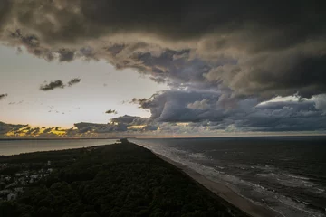 Foto op Plexiglas Aerial  drone view of sunset in Hel penisula Jastarnia Puck Bay Baltic Sea © Chawran