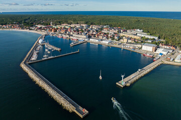 Fototapeta na wymiar Port hel peniinsula in Poland.. Aerial view of Hel Peninsula in Poland, Baltic Sea and Puck Bay . Hel city .Photo made by drone from above. Hel seaport