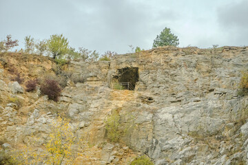 Fototapeta premium Beautiful view of mountains and rocks on an autumn day near a Konepruske Caves,