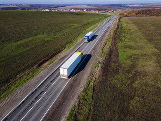 White Truck with Cargo Semi Trailer Moving on Summer Road. Aerial Top View - 727956993