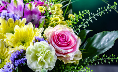 Composition with a bouquet of freshly cut flowers