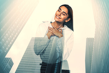 Happy cheerful young businesswoman silhouette on blurry bright city background. Success, future and...