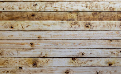 background of burnt wooden boards placed next to each other