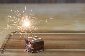 chocolate birthday cake with sparkler 