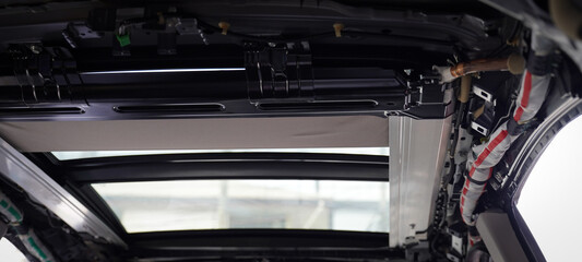 close up of a car with sun roof repairing