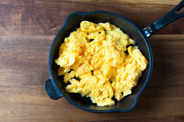 scrambled eggs in a frying pan