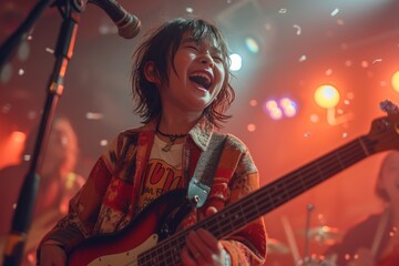 A young musician captivates the audience with their electric guitar at a rock concert, showcasing...