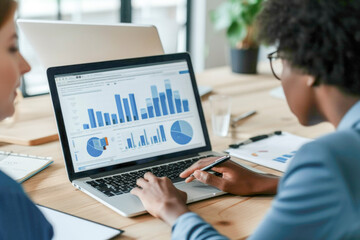 Top view finance dashboard data display on laptop screen with analyzed chart for marketing indication.