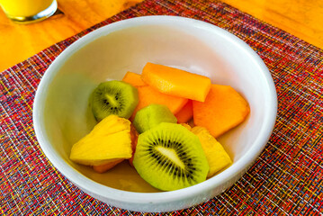 Fruit in a bowl for breakfast watermelon kiwi mango pineapple.
