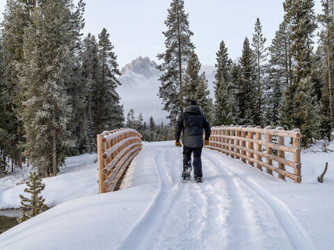 Man on snowshoes in a winter wilderness in Idaho