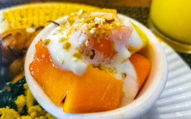 Fruit in a bowl for breakfast Papaya Pineapple Honeydew melon.