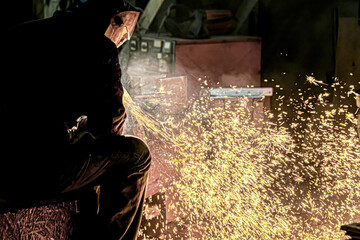 Plasma cutting and cutting of a workpiece with a graphite electrode.
