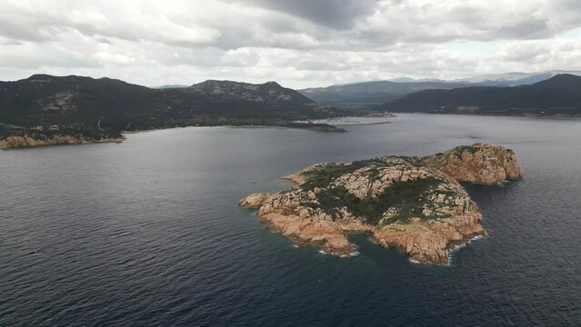 Aerial drone shots of the port of Teulada with Isola Rossa and Tramatzu beach with white sand and crystal clear water.