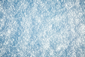 Close up view of snow texture, abstract natural background with copy space.