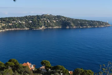 Papier Peint photo Villefranche-sur-Mer, Côte d’Azur A panoramic view of Villefranche-sur-Mer and the Mediterranean sea from the Boron Mount. Nice, France, December 26, 2023.