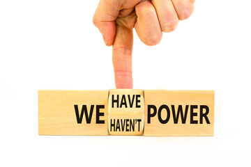 We have or not power symbol. Concept word We have or have not power on beautiful wooden cubes. Beautiful white table white background. Business and we have or not power concept. Copy space.